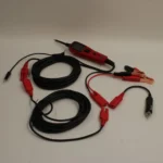 Autel PowerScan PS100 diagnostic tool and extra long connection cables for vehicle testing.