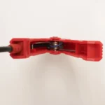 Cross-section view showing the spring mechanism inside the red clamp of the Launch BST360.