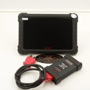 The accessories for the Autel 909 device, laid out and ready for a diagnostic session.