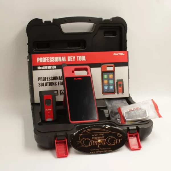 KM100 kit contents including the Autel main tool, VCI, and Universal Smart Key packaging, Compu-Car.