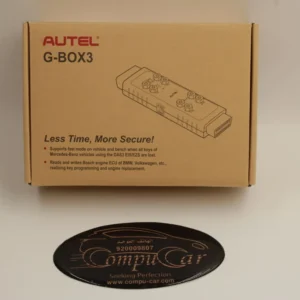 Front view of the Autel G-Box adapter retail box with the CompuCar logo for programming.