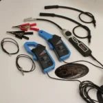 أدوات اختبار الإشعال ومضخمات التيار المستمر AC/DC، جزء من MaxiSYS Oscilloscope Accessory.